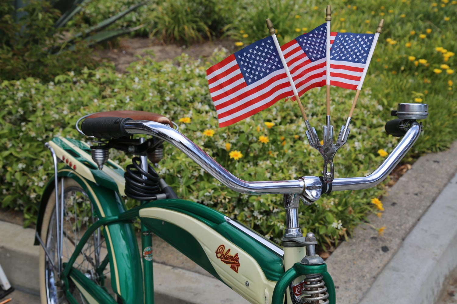 green bike with american flags
