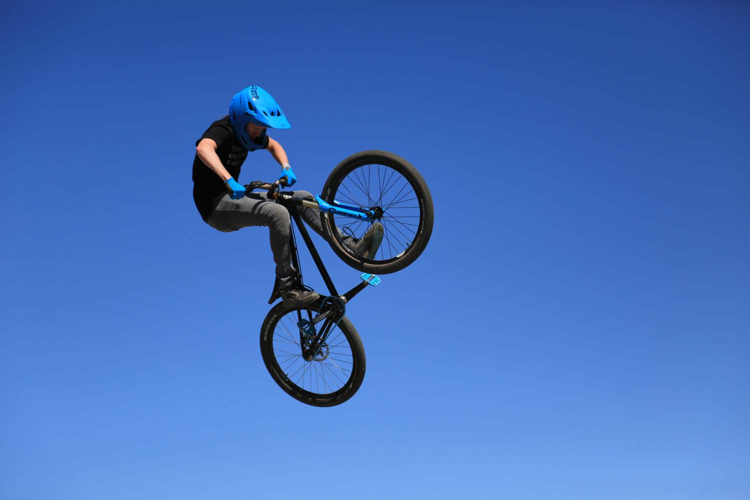 Bike jumping into the air
