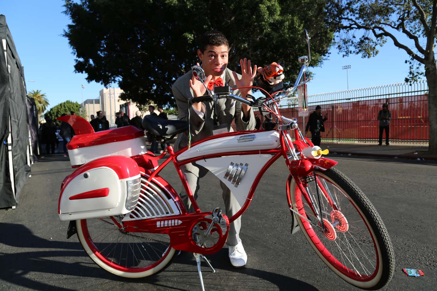 peewee herman look-a-like with bike

